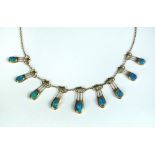 An Art Nouveau style opal fringe necklace, possibly by Murle Bennett & Co, the nine oval opal