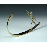 A Hagenauer gilt bronze model of a Gondolier, the stylised figure stands towards the back of the