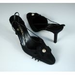 Chanel, a pair of black stiletto evening sling backs, grosgrain upper and 10cm (4in) covered heel,