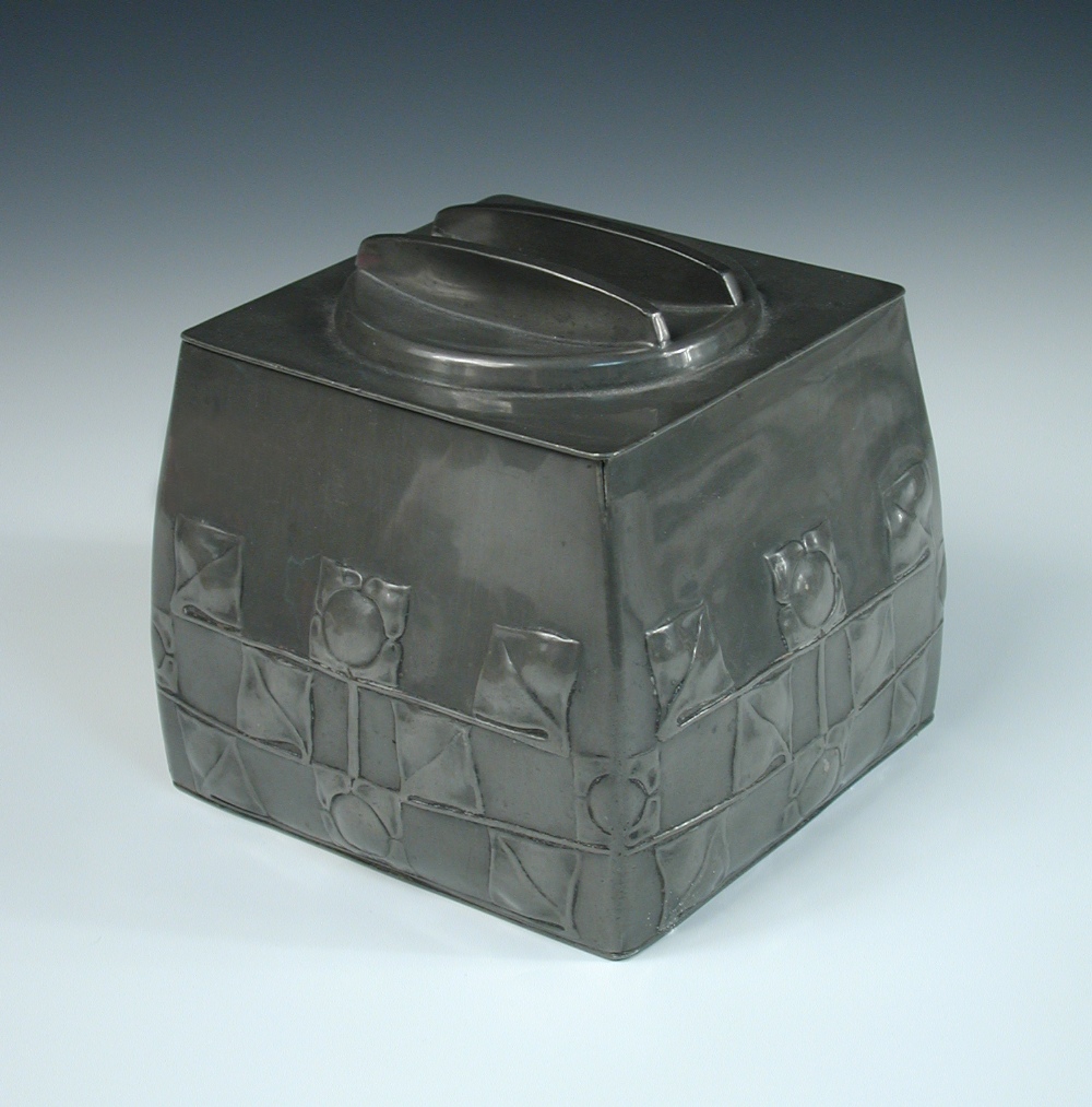Archibald Knox for Liberty & Co., a Tudric pewter biscuit box and cover, No. 0194, each side with