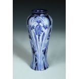 A Macintyre Moorcroft Florian ware Iris pattern vase, of inverted baluster form in shades of blue,