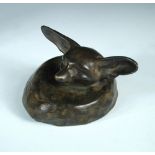 A patinated bronze model of a fox after the original by Edouard Marcel Sandoz, modelled in a