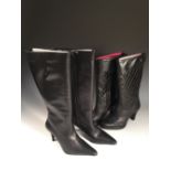 Two pairs of black knee height boots, one pair rubber-soled, stiletto boots, black calf leather with