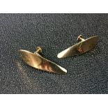 A pair of 18ct gold screw-back earrings by Georg Jensen, each designed as a polished asymmetric