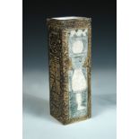 A Troika rectangular vase by Linda Hazel, decorated with abstract designs in blue on a brown ground,