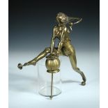 After Edouard Drouot, French (1859-1945) an Art Deco gilt bronze model of a leaping jester, the