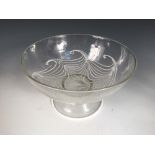 A Gray-Stan glass footed bowl, the clear glass bowl with applied white enamel slip decoration,