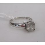 A single stone diamond ring, the round brilliant cut diamond, approx. 1.01cts, in a four claw