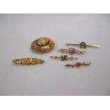 Five gold bar brooches and a mourning brooch (6)