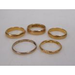 Four 22ct wedding bands (16.9g) and another yellow precious metal wedding band (1.2g)