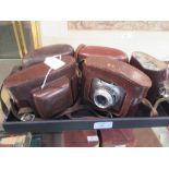 Five leather cased cameras by Agfa, Kodak and others