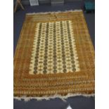 A modern gold ground Bokhara rug, 337cm x 252cm