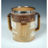 A silver mounted Doulton stoneware jug