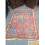 A faded Kazak rug, c. 200 x 130cm