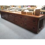 A large low Haberdashery cabinet with deep drawers, 77 x 442 x 90cm