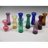 Ten coloured glass hyacinth vases tallest 22cm high