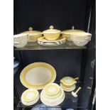 A Grays pottery 'Sunbuff' dinner service in yellow and black