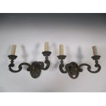 A pair of 17th century style two branch gilt bronze wall lights (2)