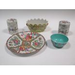 Two Canton cylindrical covered jars, a yellow ground monteith, a turquoise ground bowl and a