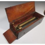 A 19th century mahogany crank wind music box, in working order, 51cm long. The cylinder is 13 inches