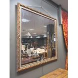 A large rectangular mirror in blue and gilt frame 139 x 145cm