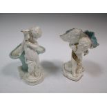 Two Moore's Bros. porcelain figures of putto, tallest 24cm high