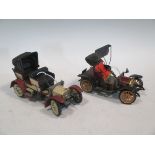 A Schucco clockwork tin plate model of a 1902 Mercedes and another of a 1909 Mercedes (2)