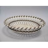 An 18th century creamware chestnut basket