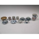 A collection of Chinese ceramics to include a Chien Lung mug, two Kanh Hsi tea bowls and saucers,
