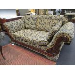 A near pair of William IV style mahogany sofas upholstered in a blue faux brocade, the ends carved