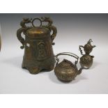 A parcel gilt temple bell, 34cm high, cash cast tea pot and a gourd shaped wine pot