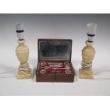 A pair of onyx table lamps and an inlaid lady's sewing box, part fitted