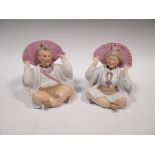 A pair of German bisque Chinoiserie nodding figures