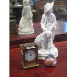 Parian figure of a boy and dog, a Copenhagen robin and a brass carriage timepiece (3)