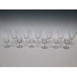 A set of six early 19th century wine glasses together with a later set of six rummers (12)