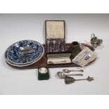 A collection of items to include silver, two Delft style dishes and other metalwares