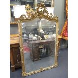 A gilt gesso framed overmantle mirror, 185 x 109cm