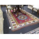 A Caucasian taste wool rug, 235 x 142cm