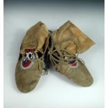 A pair of Plains Indian leather moccasins, with bead worked uppers
