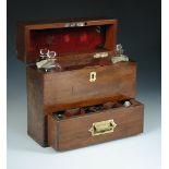 A 19th century mahogany domestic medicine chest, the hinged cover opening to reveal a fitted