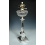 A silver based table oil lamp standard, by Hawksworth, Eyre & Co, Sheffield 1911, the square stepped