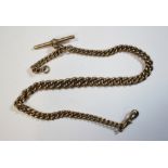 A 9ct gold curb link watch chain, 33cm, 33.5gm