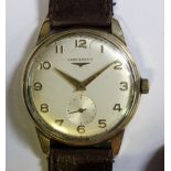 Longines - a gentleman's 9ct gold cased wristwatch, the silvered dial with applied gold coloured
