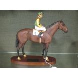 A Beswick model of Nijinsky with Lester Piggott up, 31cm on wooden base