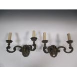 A pair of 17th century style two branch gilt bronze wall lights (2)