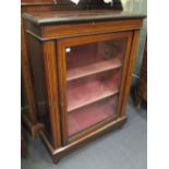 A late Victorian rosewood and line inlaid pier cabinet on turned feet