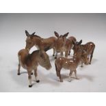 Five Beswick donkeys