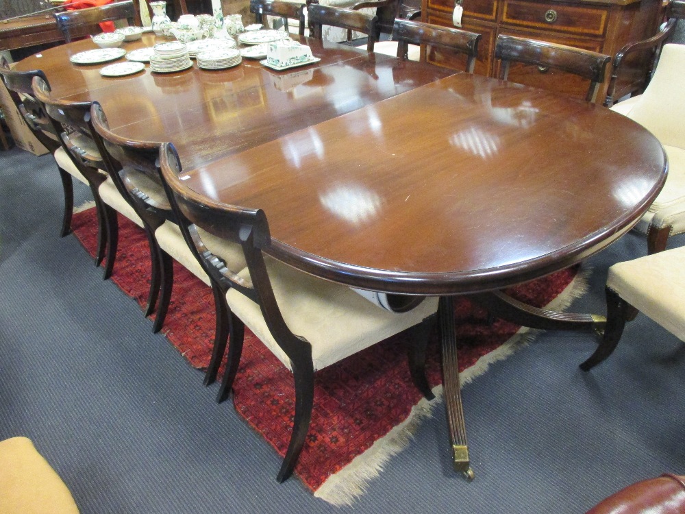 A Regency style mahogany D-end dining table with two leaves