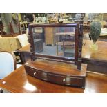 A Regency mahogany bow front dressing-table mirror with two drawers