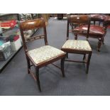 A set of four Regency mahogany bar back dining chairs, with ball moulded splats and sabre legs (4)